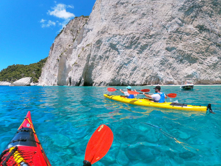 Yellow kayak at Keri cliffs