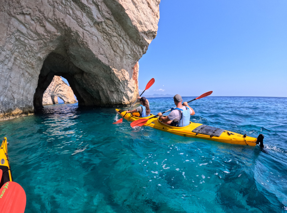 sea kayak entering inside blue cave - Zakynthos
